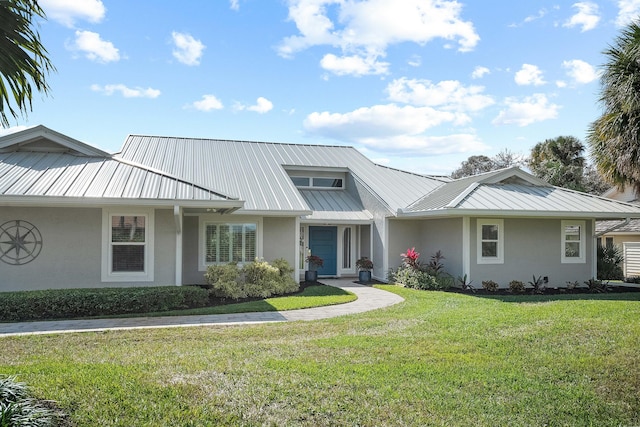 view of front of property with a front lawn