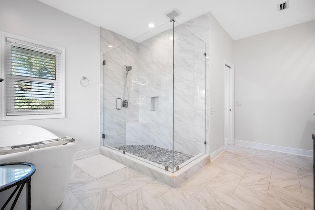 bathroom featuring an enclosed shower