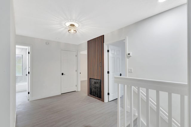 corridor featuring light hardwood / wood-style flooring