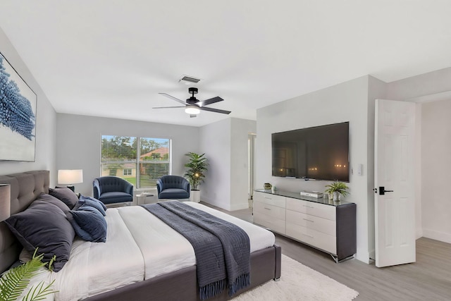 bedroom featuring ceiling fan and light wood-type flooring