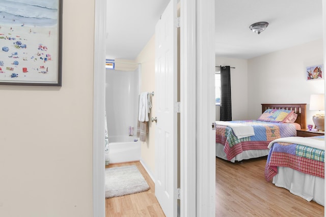 bedroom with light hardwood / wood-style flooring