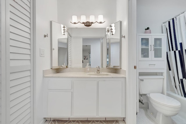 full bathroom featuring shower / bathtub combination with curtain, vanity, tile patterned floors, and toilet