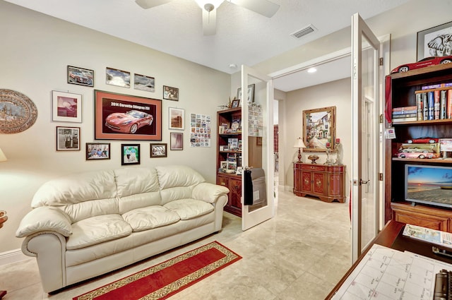 living room with ceiling fan