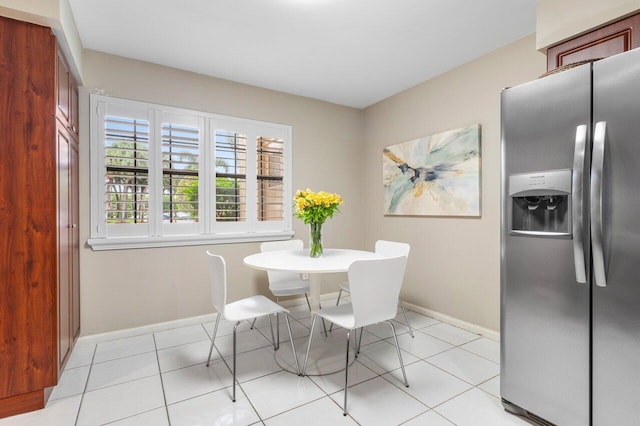 dining room with light tile patterned floors