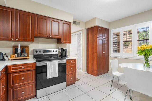 living room with light tile patterned floors