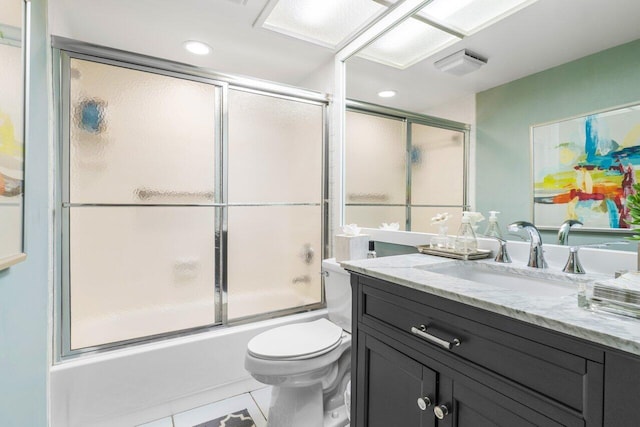 full bathroom with vanity, tile patterned flooring, enclosed tub / shower combo, and toilet