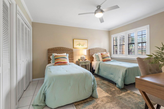 tiled bedroom with crown molding and ceiling fan