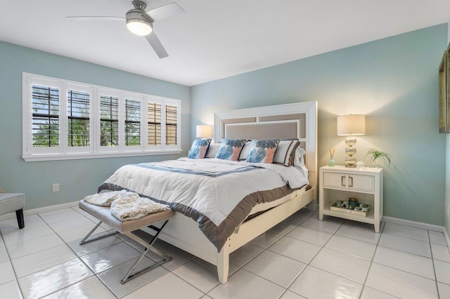 bedroom with light tile patterned floors and ceiling fan