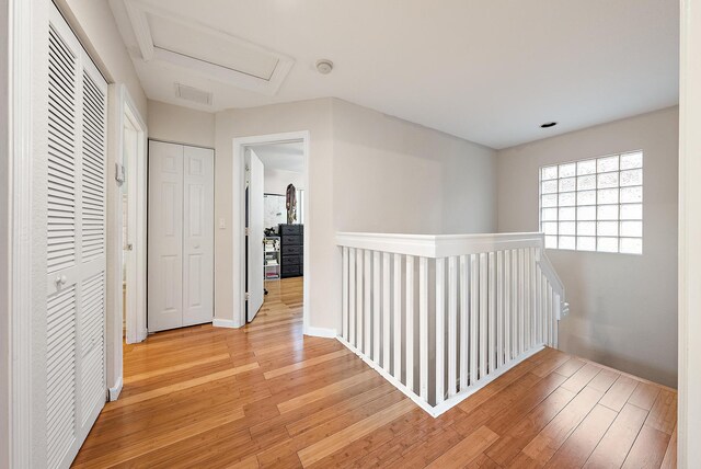 bedroom with hardwood / wood-style flooring and a textured ceiling