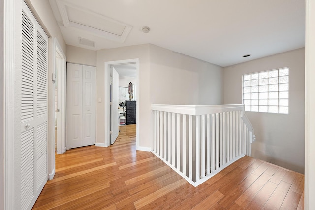 hallway featuring hardwood / wood-style flooring