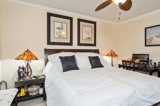 bedroom featuring crown molding and ceiling fan