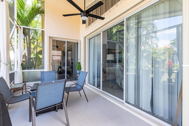 sunroom / solarium with ceiling fan