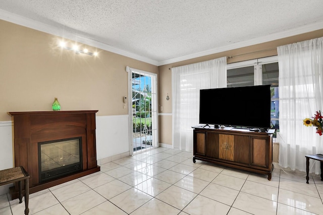 tiled living room featuring ornamental molding and a textured ceiling