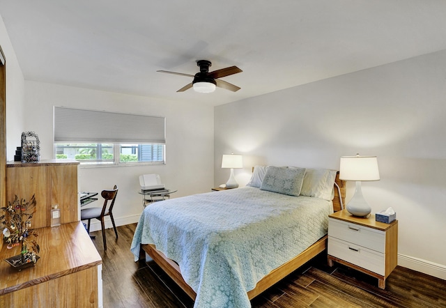 bedroom with dark wood-type flooring and ceiling fan