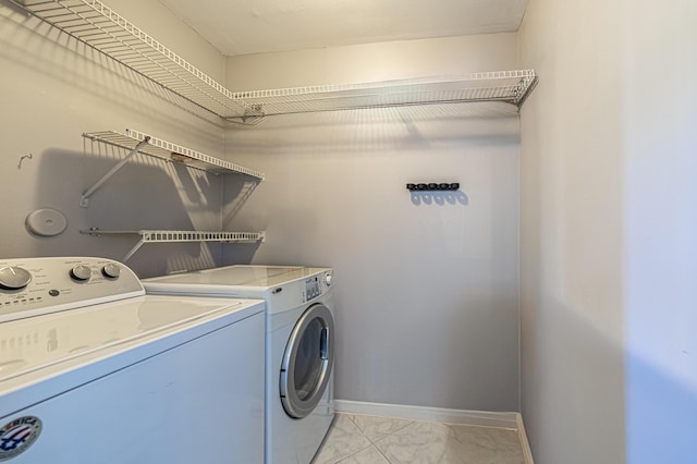 washroom featuring separate washer and dryer