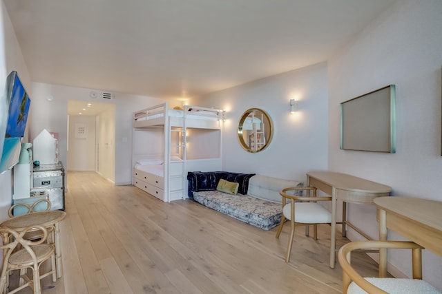 living room with light hardwood / wood-style floors