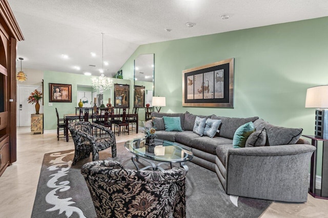 living room with an inviting chandelier, vaulted ceiling, and a textured ceiling