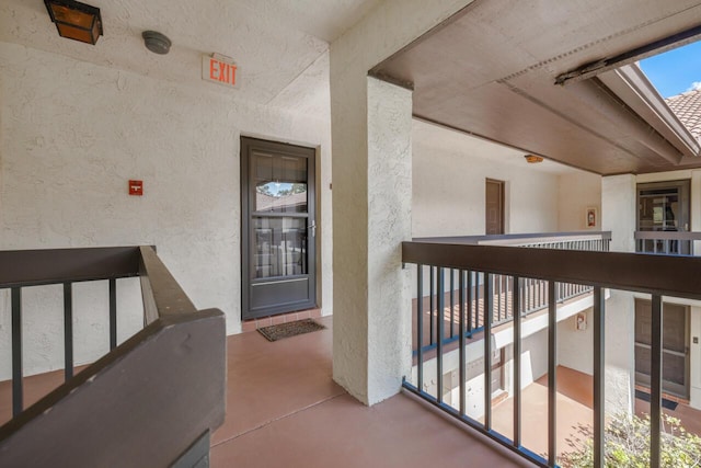 property entrance with a balcony