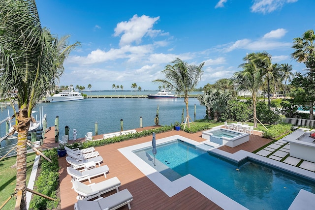 view of swimming pool featuring an in ground hot tub and a deck with water view