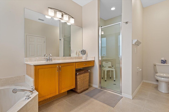 full bathroom with vanity, shower with separate bathtub, tile patterned floors, and toilet