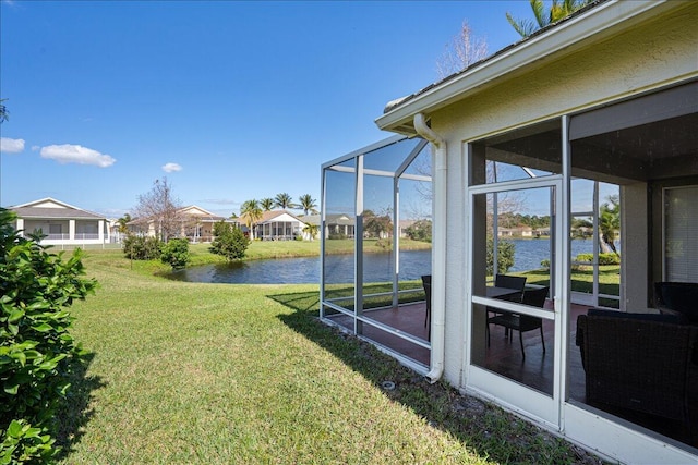 view of yard with a water view