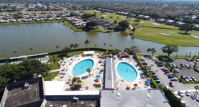 birds eye view of property featuring a water view