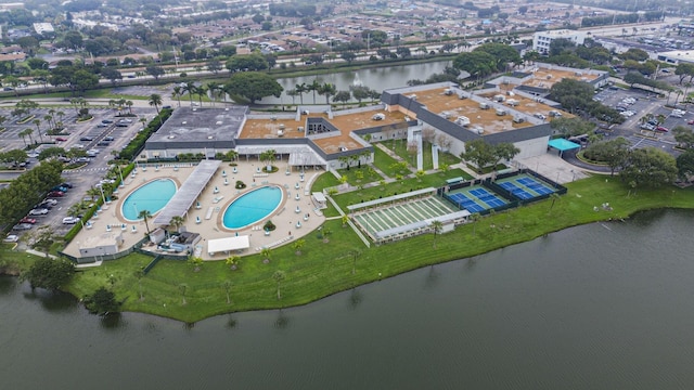 birds eye view of property featuring a water view