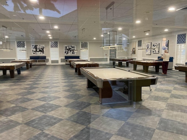 recreation room with crown molding and billiards