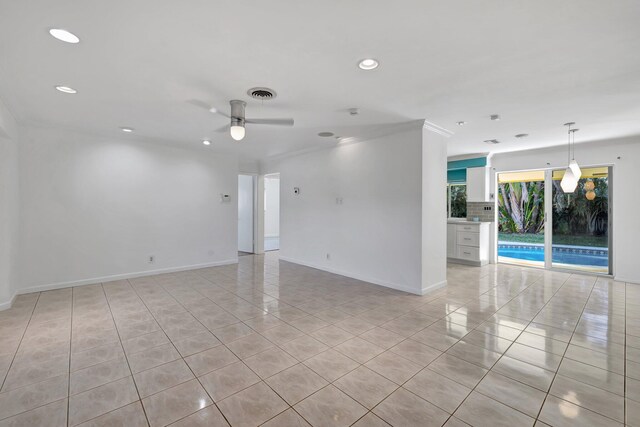 5801 NE 17th Ave, Fort Lauderdale, FL 33334 - spare room with light tile patterned floors, visible vents, baseboards, and a ceiling fan