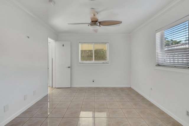 empty room with light tile patterned floors, ceiling fan, baseboards, and crown molding