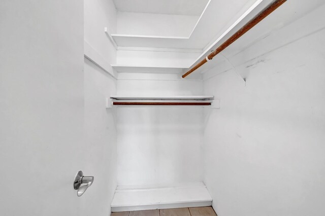 unfurnished room featuring crown molding, ceiling fan, and dark hardwood / wood-style floors