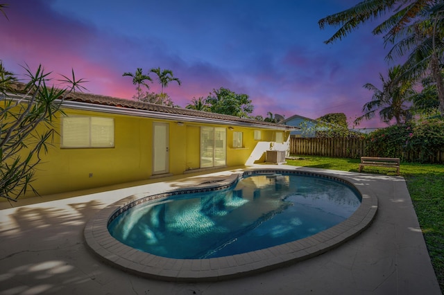 view of swimming pool featuring a fenced in pool, french doors, fence, and a patio