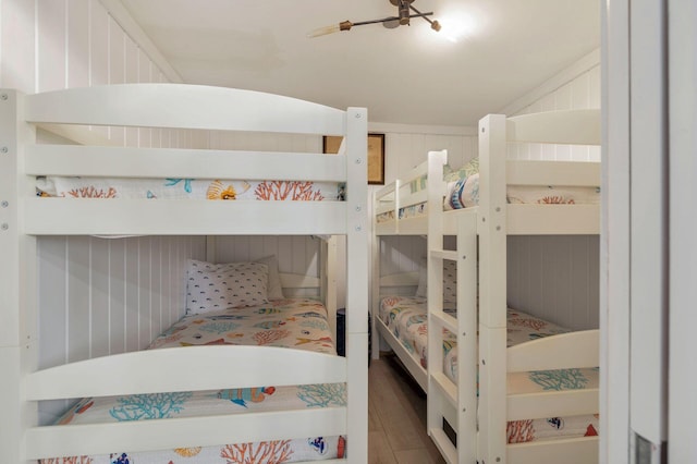 bedroom with hardwood / wood-style flooring