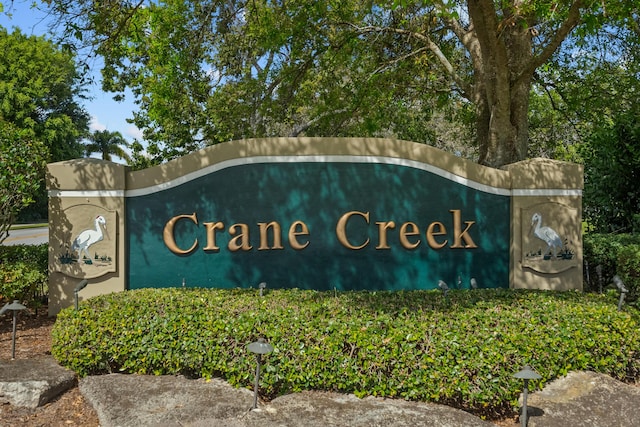 view of community sign