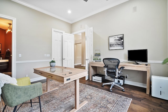 home office with crown molding and dark hardwood / wood-style floors