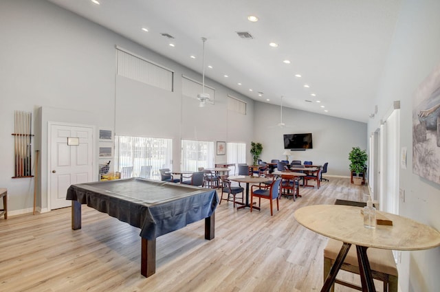 game room with billiards, light hardwood / wood-style flooring, high vaulted ceiling, and ceiling fan