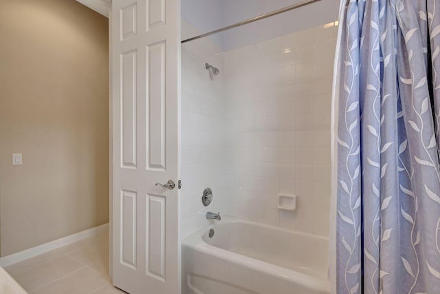 bathroom with tile patterned floors and shower / bath combination with curtain