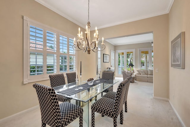 carpeted dining space with a notable chandelier and ornamental molding