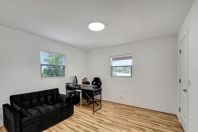 home office featuring light wood-type flooring