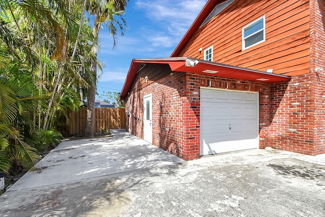 view of home's exterior with a garage