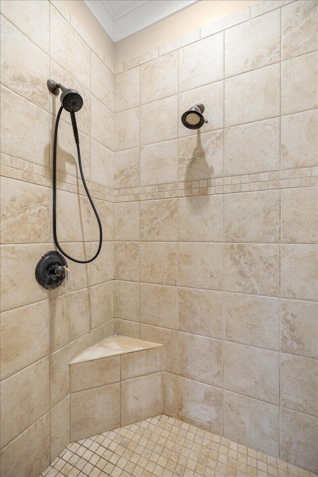 bathroom featuring curtained shower, tile patterned floors, and toilet