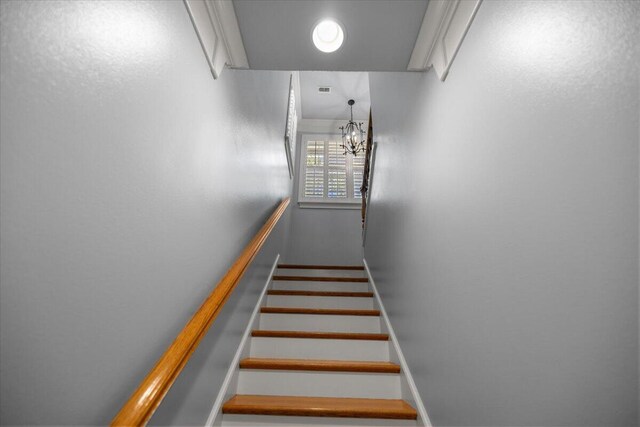 hallway featuring crown molding, coffered ceiling, beam ceiling, and hardwood / wood-style flooring