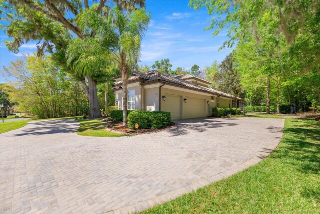 view of property exterior featuring a garage