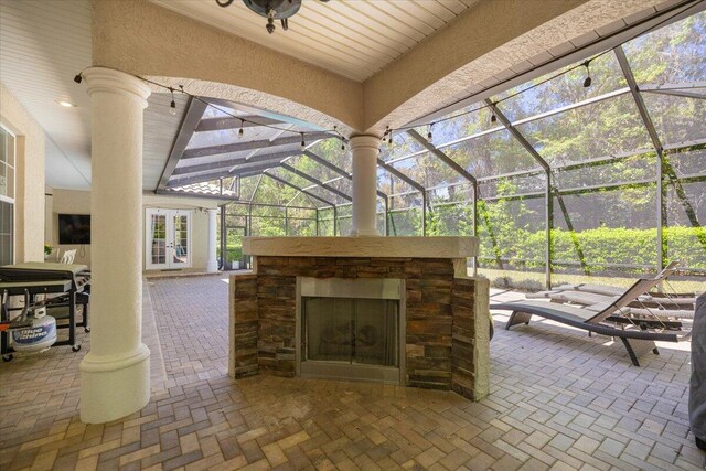 dining area featuring ceiling fan and french doors