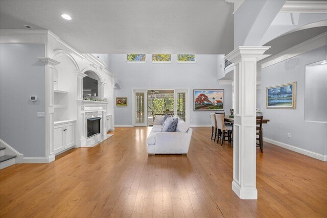 dining area featuring a raised ceiling, crown molding, dark hardwood / wood-style floors, and a chandelier