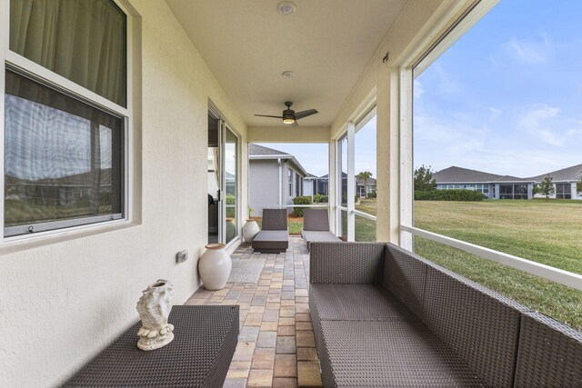 view of yard with glass enclosure