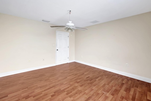 unfurnished room featuring hardwood / wood-style flooring and ceiling fan