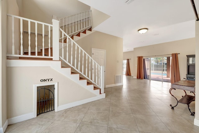 interior space featuring light tile patterned flooring