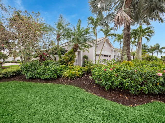 view of yard featuring a garage