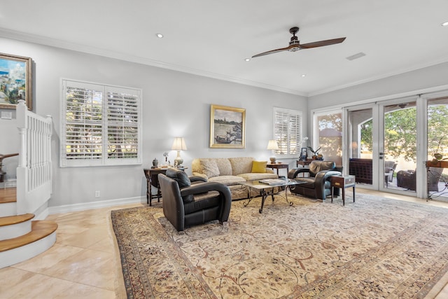 living room with crown molding, light tile patterned floors, and ceiling fan